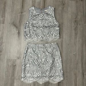 Silver two piece set. Sequin detailing. Size medium.